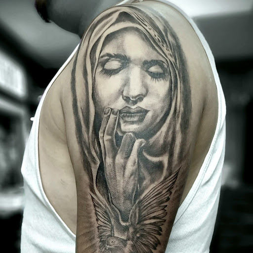 Explore fishing tattoo ideas for men, creative tattoo ideas in Bronx, available at Brass Knuckles Ink Tattoo Studio