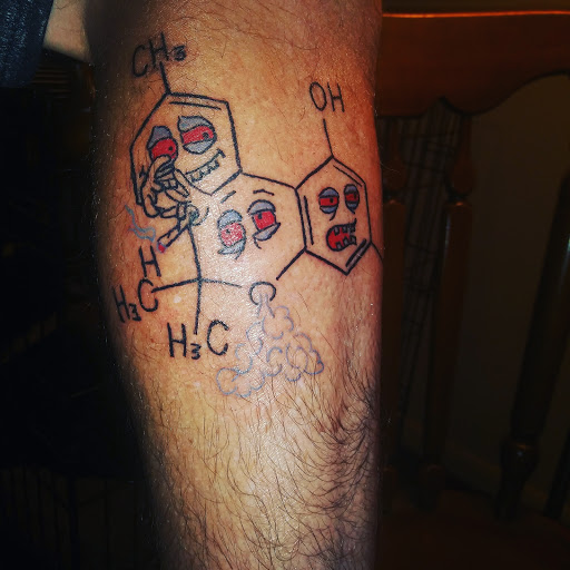 Explore behind ear tattoo ideas for guys, creative tattoo ideas in Madison, available at Archangel Tattoo & Piercing