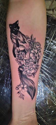 Explore butterfly tattoo cover up ideas, creative tattoo ideas in Angola, available at Hoodlum Ink