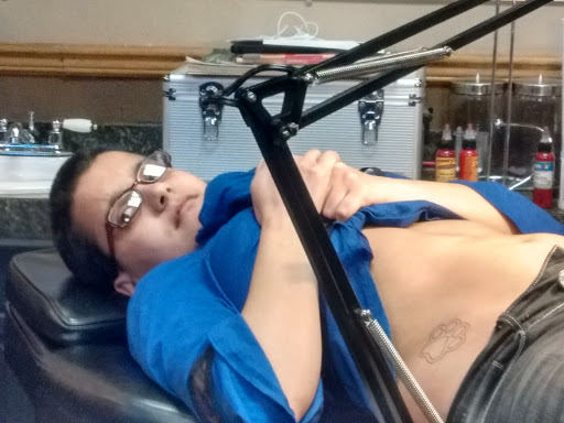 Explore dog print tattoo ideas, creative tattoo ideas in Stevens Point, available at Mothers Approval Tattooing