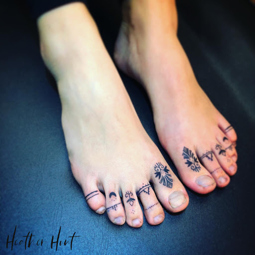 Explore matching father daughter tattoos ideas, creative tattoo ideas in Broomfield, available at Wild Child Tattoo