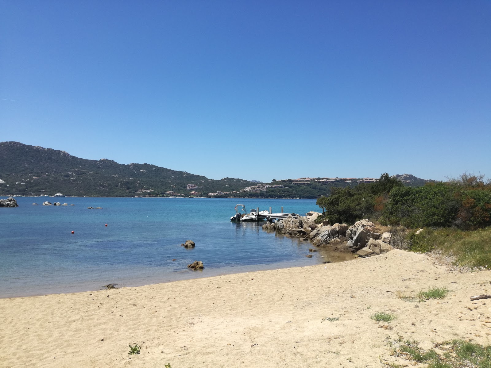Foto van Borgo di Punta Marana II met blauw puur water oppervlakte