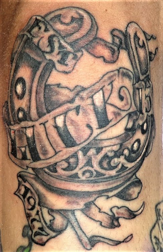 Explore tattoo ideas of dogs, creative tattoo ideas in Muscatine, available at Stigma Tattoo & Body Piercing