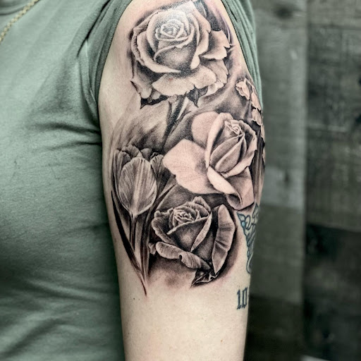 Explore collar bone tattoo ideas for women, creative tattoo ideas in Merrick, available at Wyld Chyld Tattoo