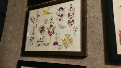 Explore tummy tattoo ideas, creative tattoo ideas in Marietta, available at Lucky Draw Tattoos III