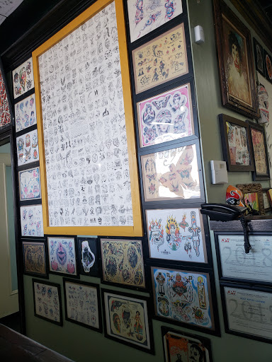 Find girl tattoos ideas for your next unique tattoo in Morrow at The Inkers Parlour