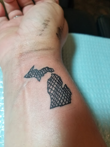 Explore tattoo ideas for guys on chest, creative tattoo ideas in Traverse City, available at Traverse City Tattoo