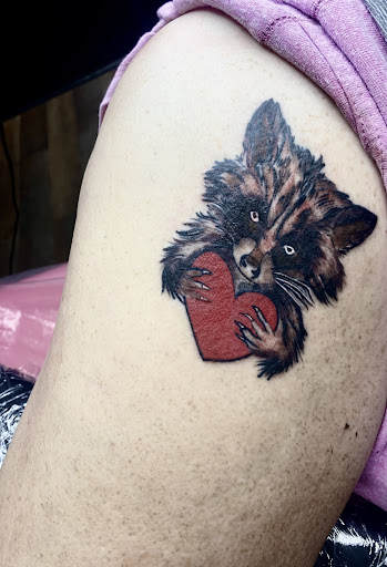 Explore war tattoo ideas, creative tattoo ideas in Lake City, available at Crooked Spines Tattoo Studio