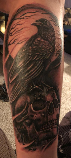 Explore lung cancer ribbon tattoo ideas, creative tattoo ideas in Canton, available at The Inkeepers Tattoo Parlor