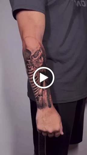 Explore tricep tattoo ideas for men, creative tattoo ideas in Kissimmee, available at Fallen Sparrow Tattoo Co