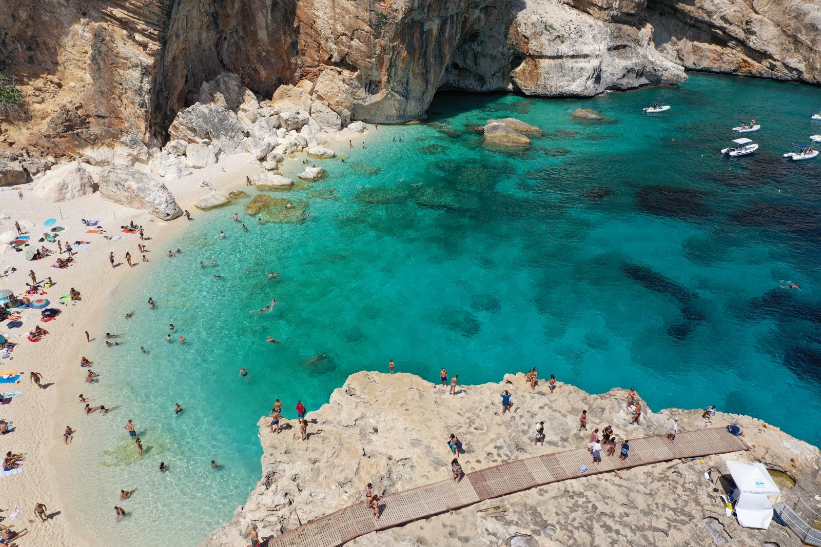 Photo of Cala Mariolu with blue pure water surface
