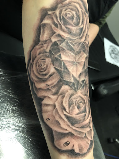 Explore memorial tattoo ideas for grandmother, creative tattoo ideas in Roxboro, available at Solo Ink Tattoo Shop Appointment Only