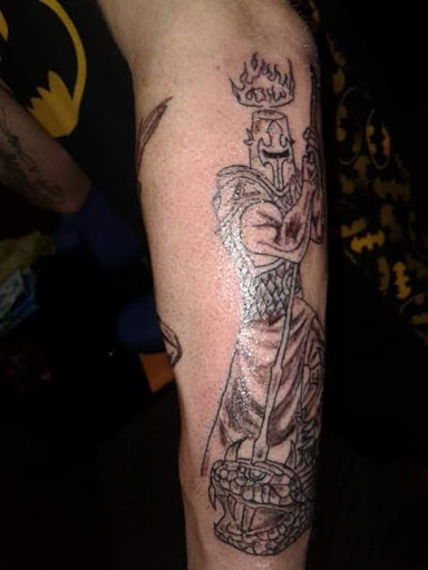 Explore snoopy tattoo ideas, creative tattoo ideas in Paris, available at Twizted Dezignz