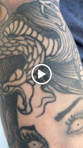 Explore black and red tattoo ideas, creative tattoo ideas in North Charleston, available at Blu Gorilla Tattoo