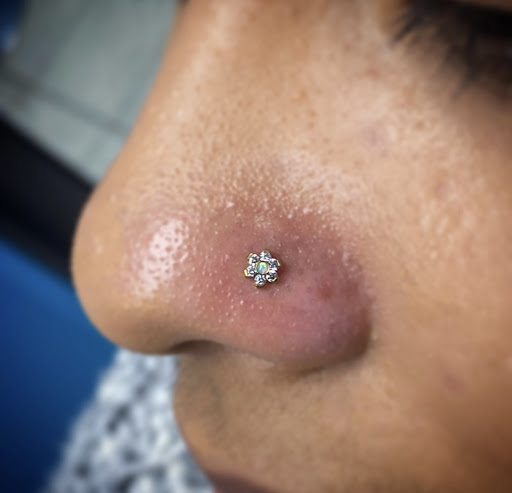 Explore tiny tattoo ideas with meaning, creative tattoo ideas in Bay Shore, available at Piercings By Dean 95