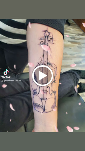 Explore violin tattoo ideas, creative tattoo ideas in Riverview, available at Believers Ink