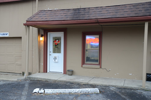 Explore floral tattoo cover up ideas, creative tattoo ideas in Greenfield, available at Tattoos In Time Studio