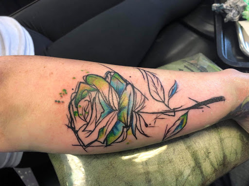 Explore wedding ring tattoo ideas for men, creative tattoo ideas in Bristol, available at Utopia Tattoo, Piercing and PMU