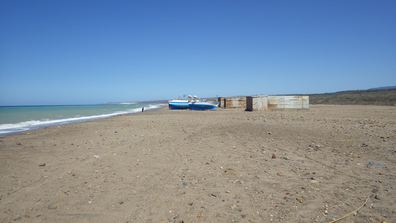 Foto de Plage Sammar con arena gris superficie