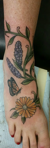 Explore tattoo filler ideas men, creative tattoo ideas in Erie, available at Wayward Tattoo Studio