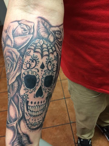 Find music notes tattoo ideas for your next unique tattoo in Tucson at Sacred Art Tattoo Studio