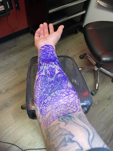 Explore massage therapy tattoo ideas, creative tattoo ideas in El Paso, available at Wyze Guyz Tattoo Parlor