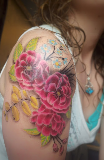 Explore fish tattoo ideas for men, creative tattoo ideas in Kenosha, available at Dead Set Ink