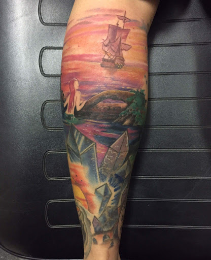 Explore neck tattoo ideas for guys, creative tattoo ideas in Savannah, available at Tatlyfe Studios