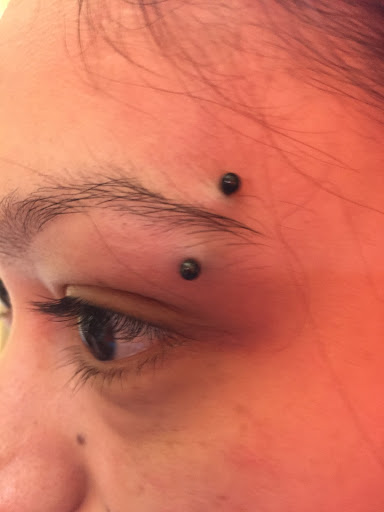 Explore tattoo behind ear ideas, creative tattoo ideas in San Diego, available at Body Art Salon