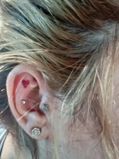 Explore childhood tattoo ideas, creative tattoo ideas in Mckinney, available at The Magic Needle Piercing Studio