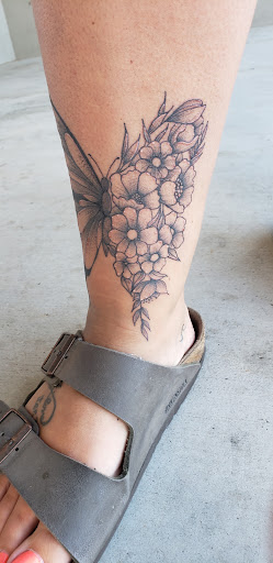 Explore e.t. tattoo ideas, creative tattoo ideas in Cornelia, available at Prismatic Pulse Tattoo