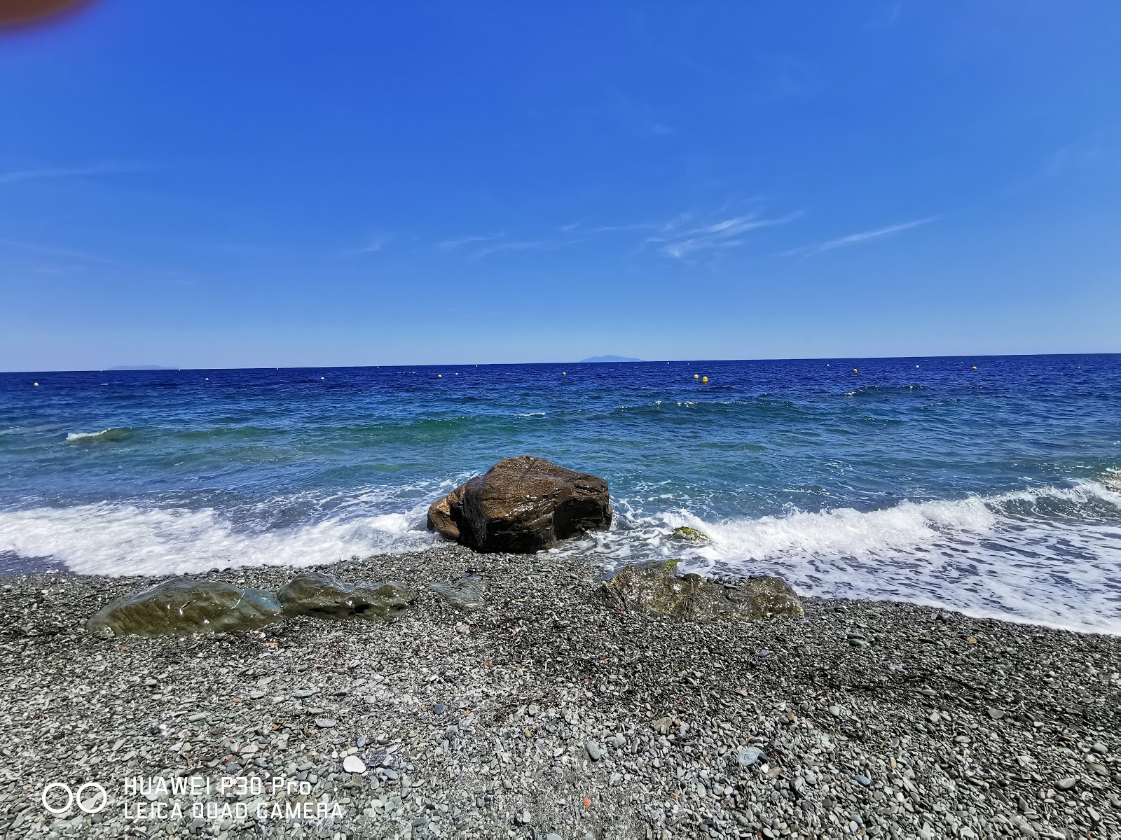 Toga beach的照片 带有宽敞的海岸线