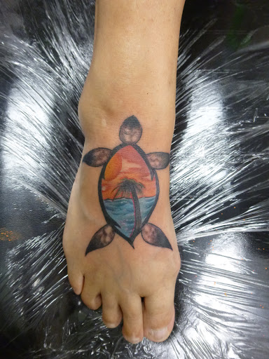 Tattoo Shop «magnum opus tattoo company», reviews and photos, 1817 Padre Blvd #4, South Padre Island, TX 78597, USA