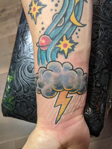 Explore weightlifting tattoos ideas, creative tattoo ideas in Las Cruces, available at Camino Tattoo Studio & Art Gallery