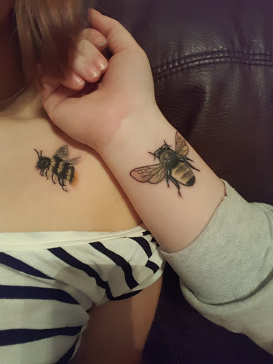 Explore small neck tattoo ideas, creative tattoo ideas in Indianapolis, available at Artistic Skin Designs Inc