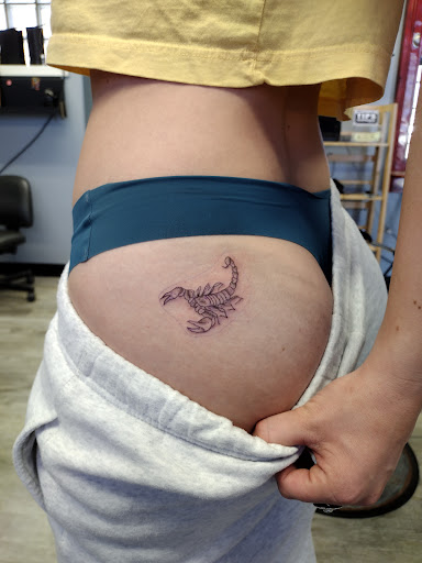 Explore dog bone tattoo ideas, creative tattoo ideas in La Crosse, available at La Crosse Tattoo