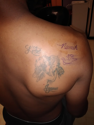 Explore tattoo for son ideas, creative tattoo ideas in Bowling Green, available at Taboo Tattoos and Piercings