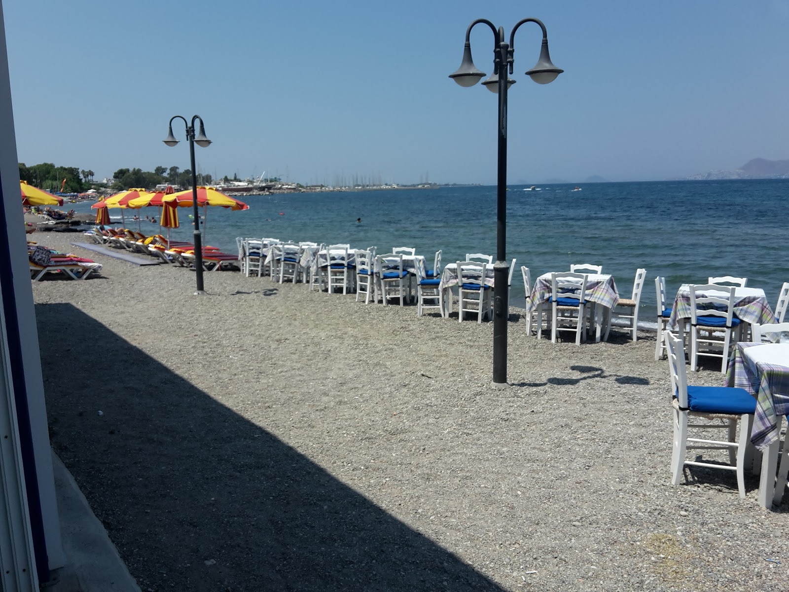 Foto von Paradiso Beach mit türkisfarbenes wasser Oberfläche