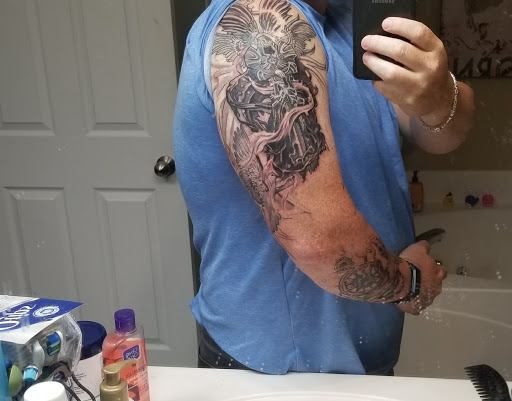 Tattoo Shop «Raining Ink», reviews and photos, 420 W 7th St, Columbia, TN 38401, USA