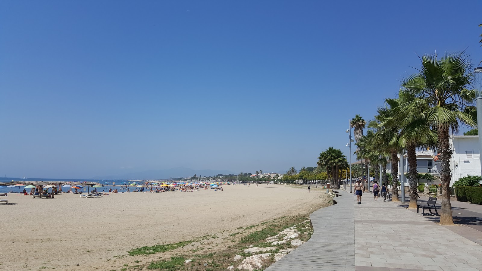 Fotografie cu Platja de la Llosa și așezarea