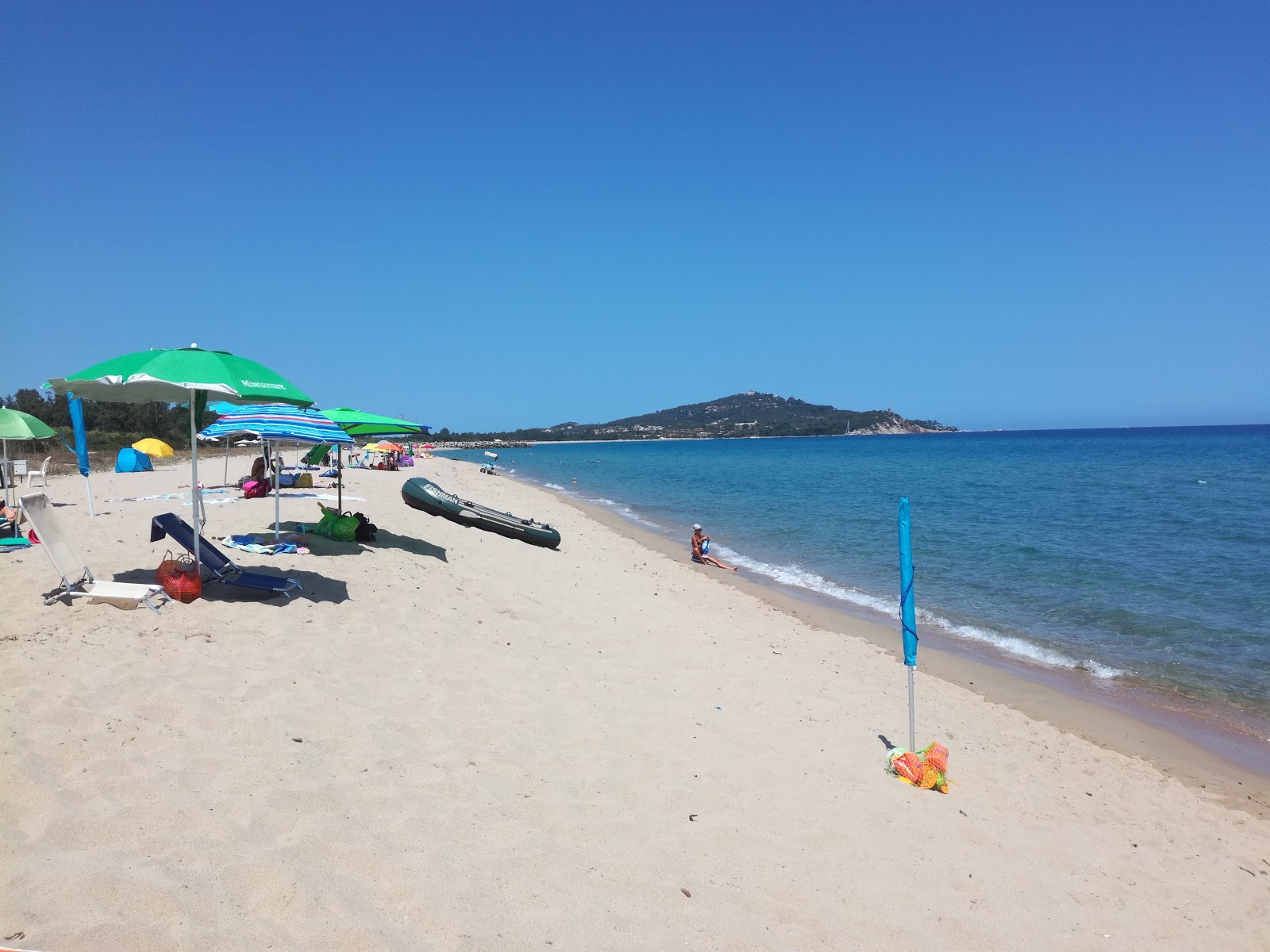Fotografija Spiaggia di S'Orologiu z svetel pesek površino