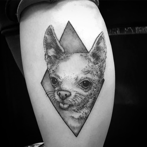 Explore tiki tattoo ideas, creative tattoo ideas in Chattanooga, available at Standard Ink Tattoo Co