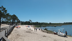 Foto von Praia Lagoa da Ervedeira und die siedlung