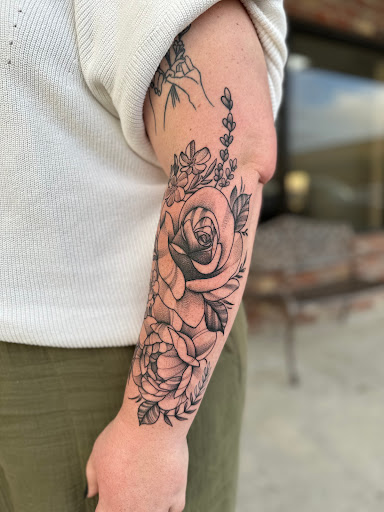 Explore cupid tattoo ideas, creative tattoo ideas in Prairieville, available at Nolana Tattoo & Piercing
