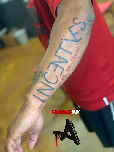 Explore men's inner bicep tattoo ideas, creative tattoo ideas in Hammond, available at Famous Ink, Inc.