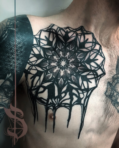 Explore womb tattoo ideas, creative tattoo ideas in Lopez Island, available at Soot and Bone Body Art Studio