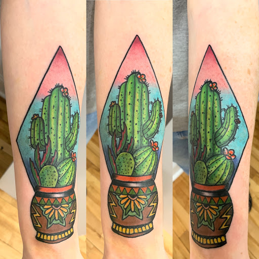 Explore female throat tattoo ideas, creative tattoo ideas in Kansas City, available at Golden Stag Tattoo and Gallery