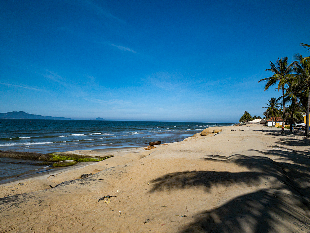 Foto von Cua Dai Beach II und die siedlung