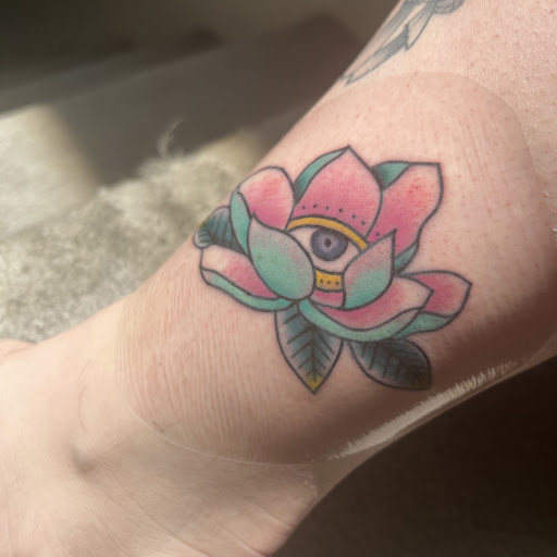 Explore cover up tattoo ideas female back, creative tattoo ideas in Loveland, available at Satori Tattoo