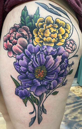 Find poppy tattoo ideas for your next unique tattoo in Romulus at Urban Rituals Piercing and Tattoo